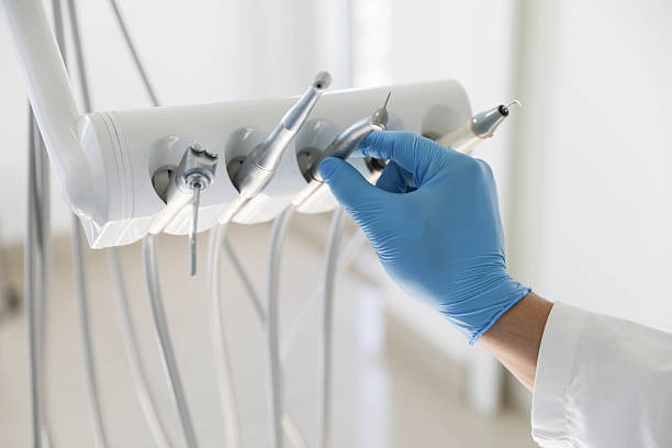 Professional Tooth Extraction technician working in Konawa, OK